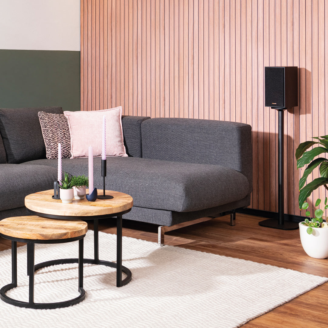 Speaker Anywhere 750 - Wireless Speaker Connection - Ambiance Image of Rear Speakers next to a Sofa | Marmitek