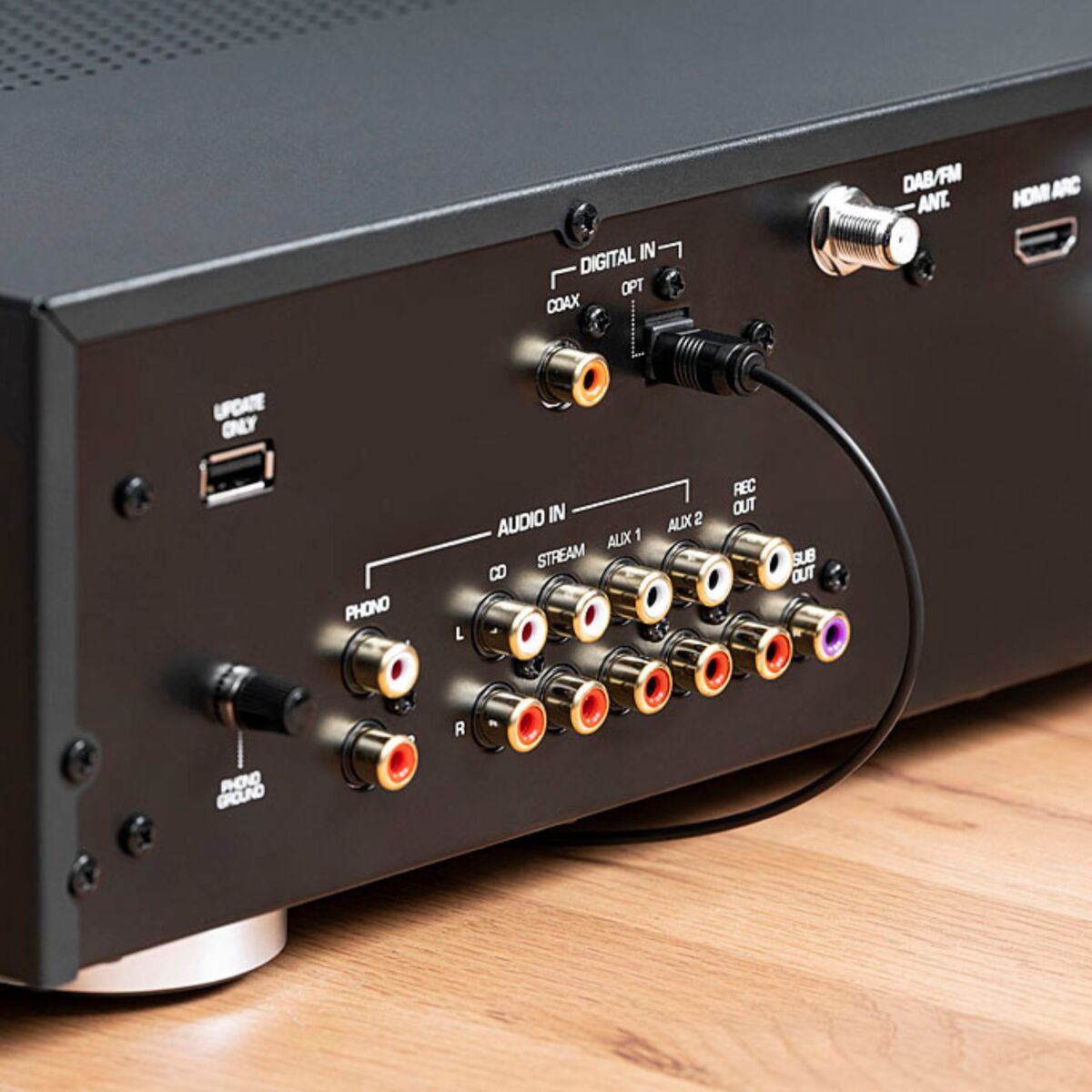 BoomBoom 100 - Bluetooth Transmitter and Bluetooth Receiver - back View Image of an AV Receiver with a BoomBoom 100 Connected to Optical in | Marmitek
