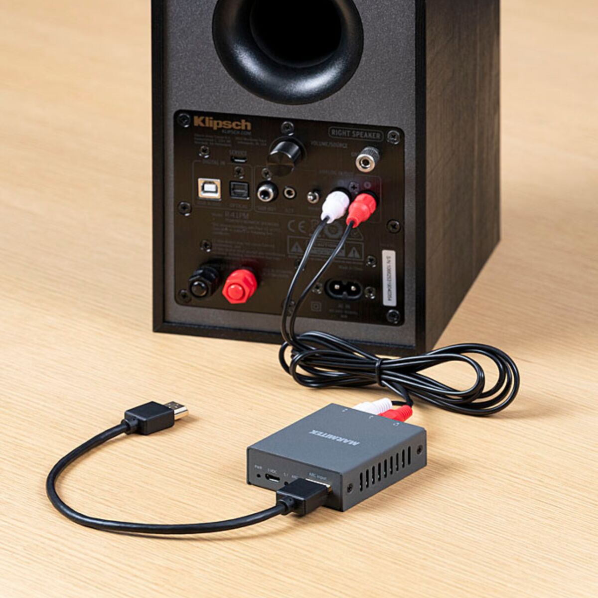 Connect ARC13 - HDMI Audio Extractor - Clos up of Connect ARC13 connected to a speaker with L/R connections | Marmitek